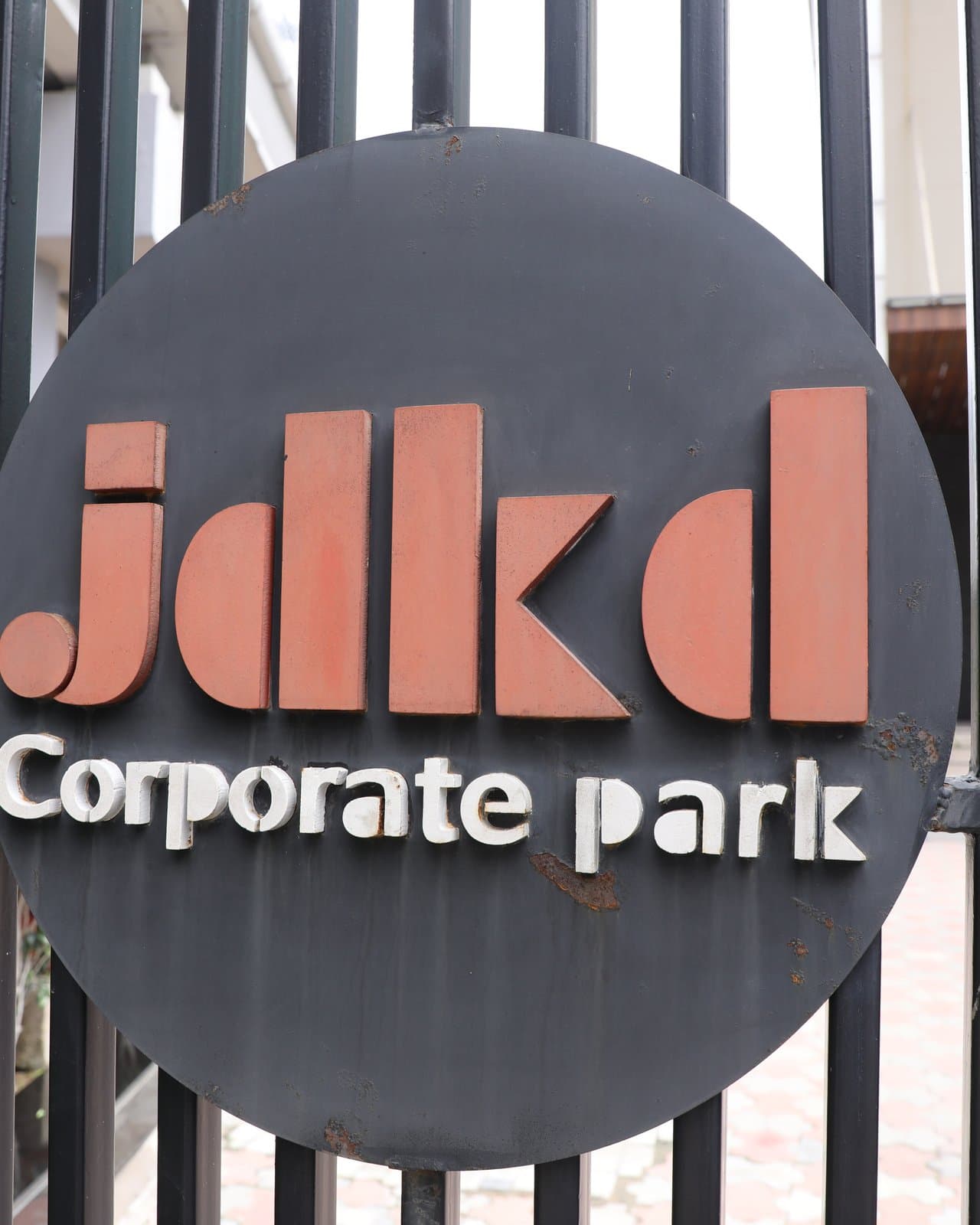 The JDKD Corporate Park sign on the A-23 gate.