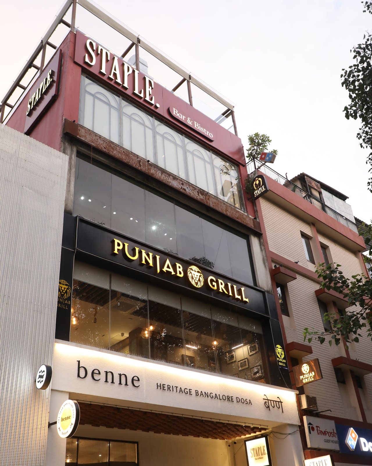 The M-82 building by day: Staple Bar & Bistro on the upper floors, Punjab Grill and Benne below.