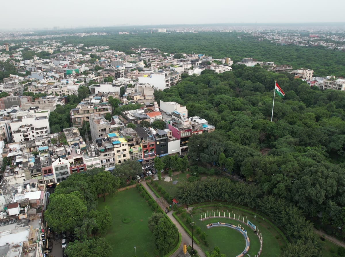 The M-82 property from the air, in its market district at dusk.