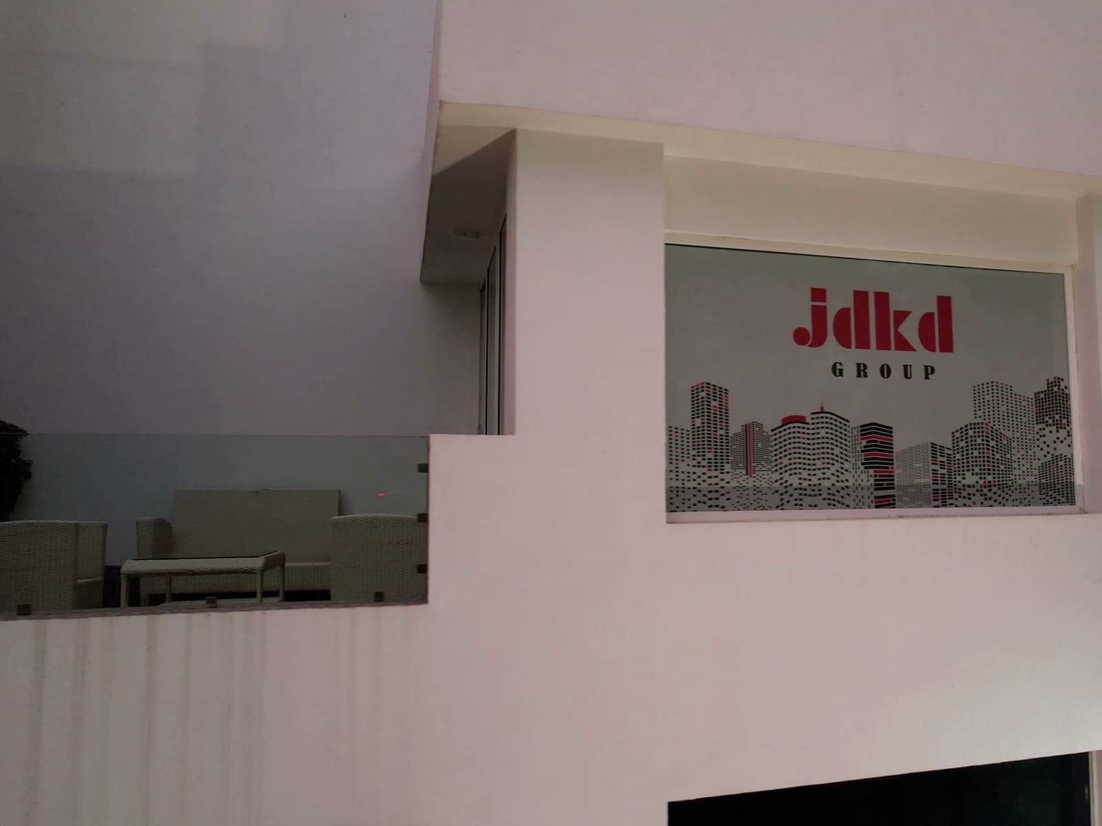 The JDKD M-39 property frontage, illuminated mark and upper terrace lounge.