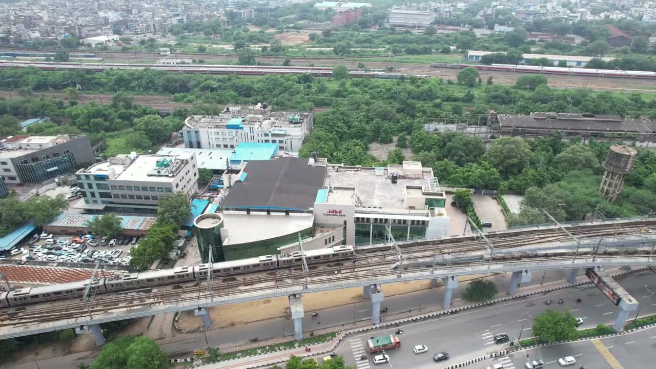 JDKD Corporate Park at plot A-23, seen from the air beside the elevated metro line.